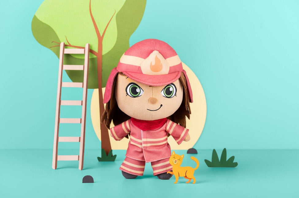 Felicity Firefighter standing in red and yellow uniform wearing helmet with a happy cat and tree and ladder in background