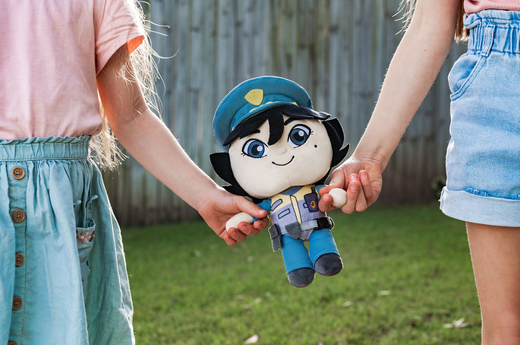 Pippa Police Officer doll helping with road safety - teaching children about community helpers
